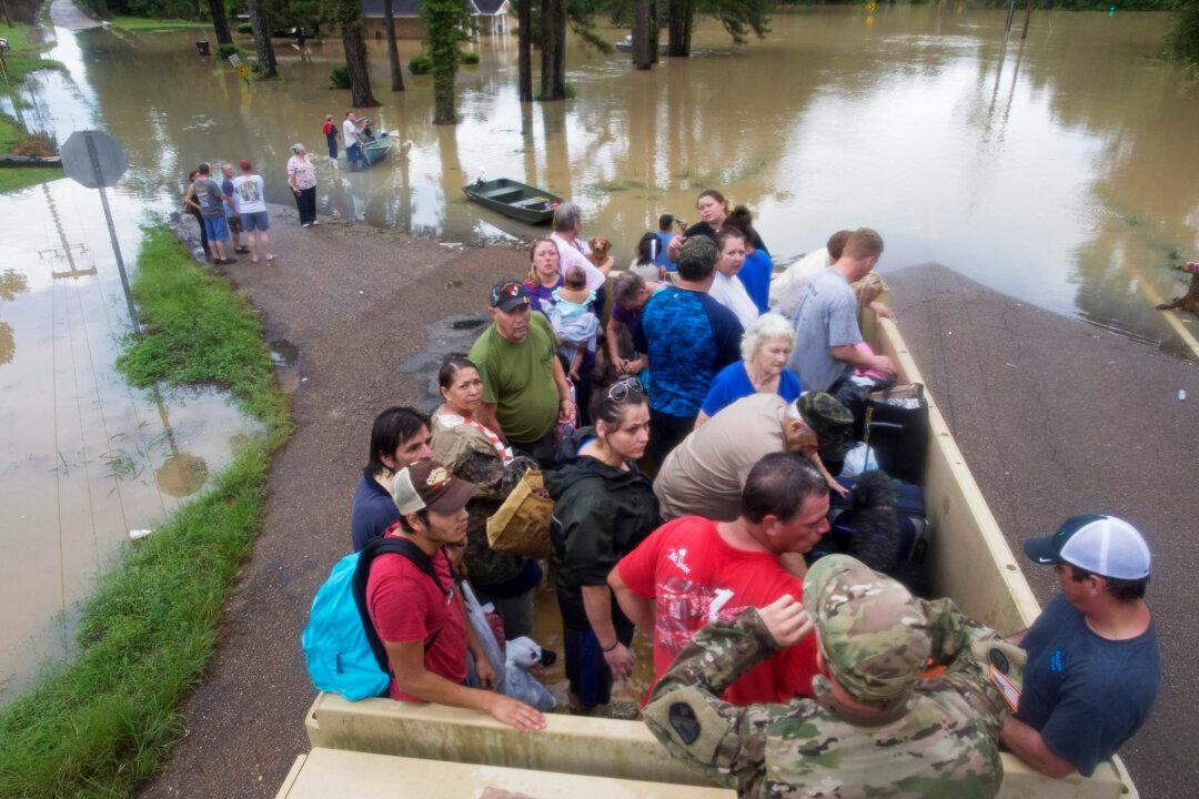 Water Everywhere, Louisiana Residents Struggle for Dry Land