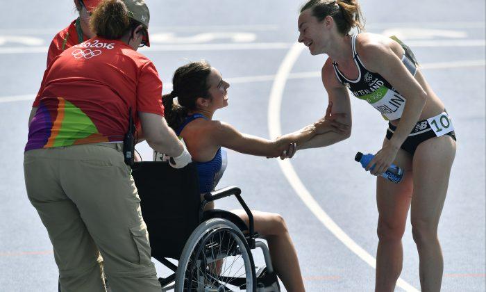 Runners Help Each Other After Fall, Lifting Olympic Spirit