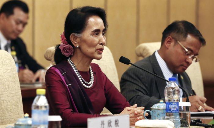 China, Burma Vow Closer Ties as Suu Kyi Visits Beijing