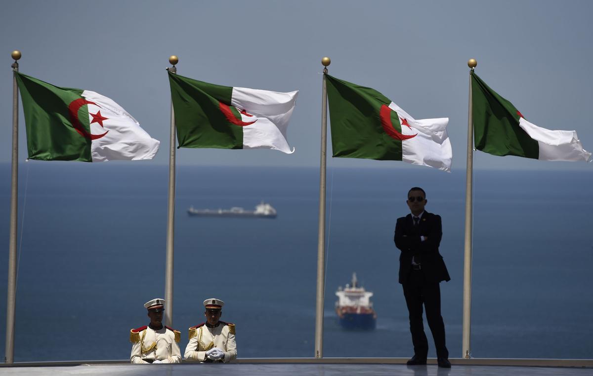 Members of the Algerian Republican Guard and a security official stand guard at the Martyrs' Memorial in the Algerian capital, Algiers, on June 15, 2015. (Farouk Batiche/AFP/Getty Images)