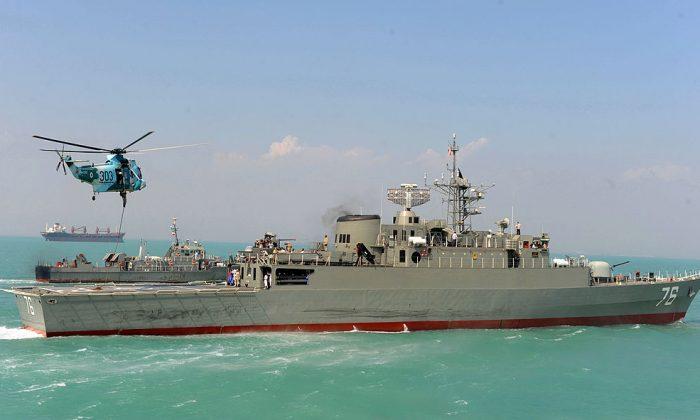 US Warship Fires Warning Shots at Iranian Boats