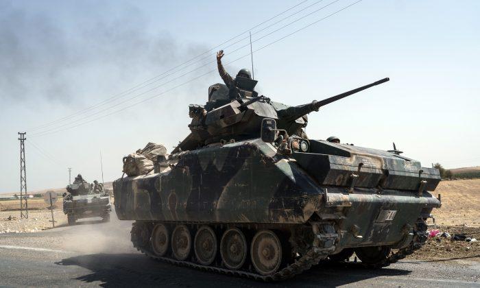 Syrian Rebels Advance on Kurds as Turkish Strikes Kill 35