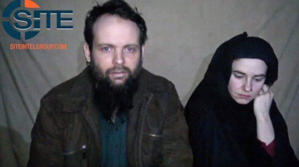 This undated image from a video released by the Afghan Taliban shows Canadian Joshua Boyle and American Caitlan Coleman, who were kidnapped in Afghanistan in 2012. (SITE Intel Group via AP)