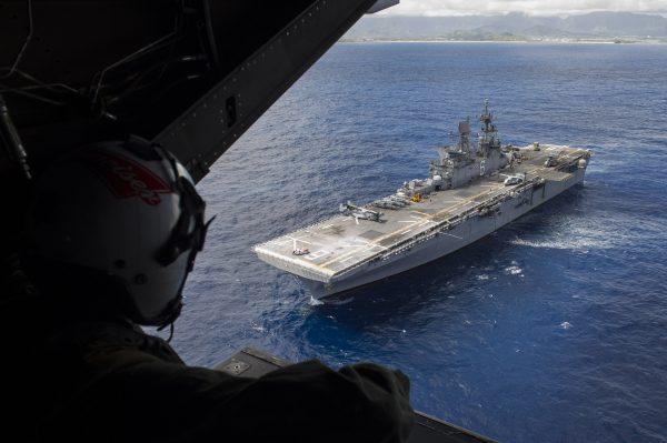 The amphibious assault ship USS America (LHA 6) conducts flight operations near the island of Hawaii in the Pacific Ocean on July 30, 2016. (U.S. Navy Mass Communication Specialist 1st Class Ryan Riley/U.S. Navy)