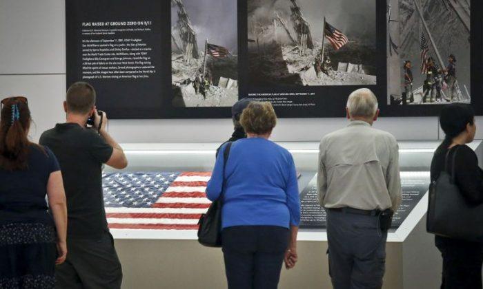 Flag That Firefighters Raised at Ground Zero Returns to WTC Site