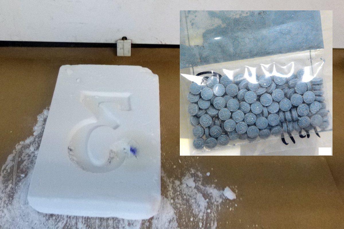 A 1 kilogram brick of fentanyl (L) and fentanyl pills (R). (Drug Enforcement Agency Media Library)