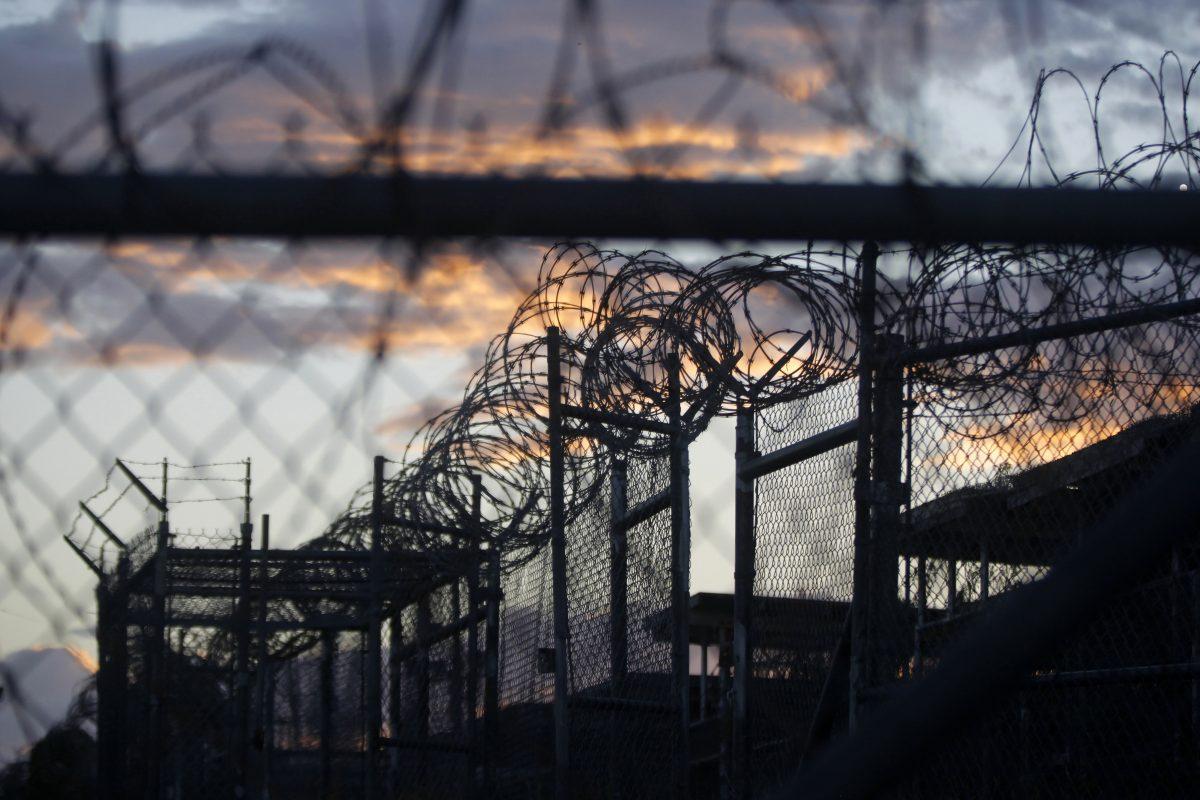 Dawn arrives at the now closed Camp X-Ray, which was used as the first detention facility for al-Qaida and Taliban militants who were captured after the Sept. 11 attacks, at the Guantanamo Bay Naval Base in Cuba on Nov. 21, 2013. (Charles Dharapak/AP Photo)