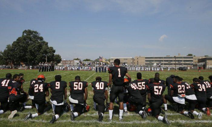 Entire High School Team Kneels for National Anthem