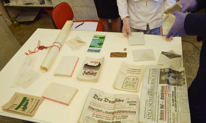 Nazi-Era Coins, Photos, Hitler’s Book Found in Poland