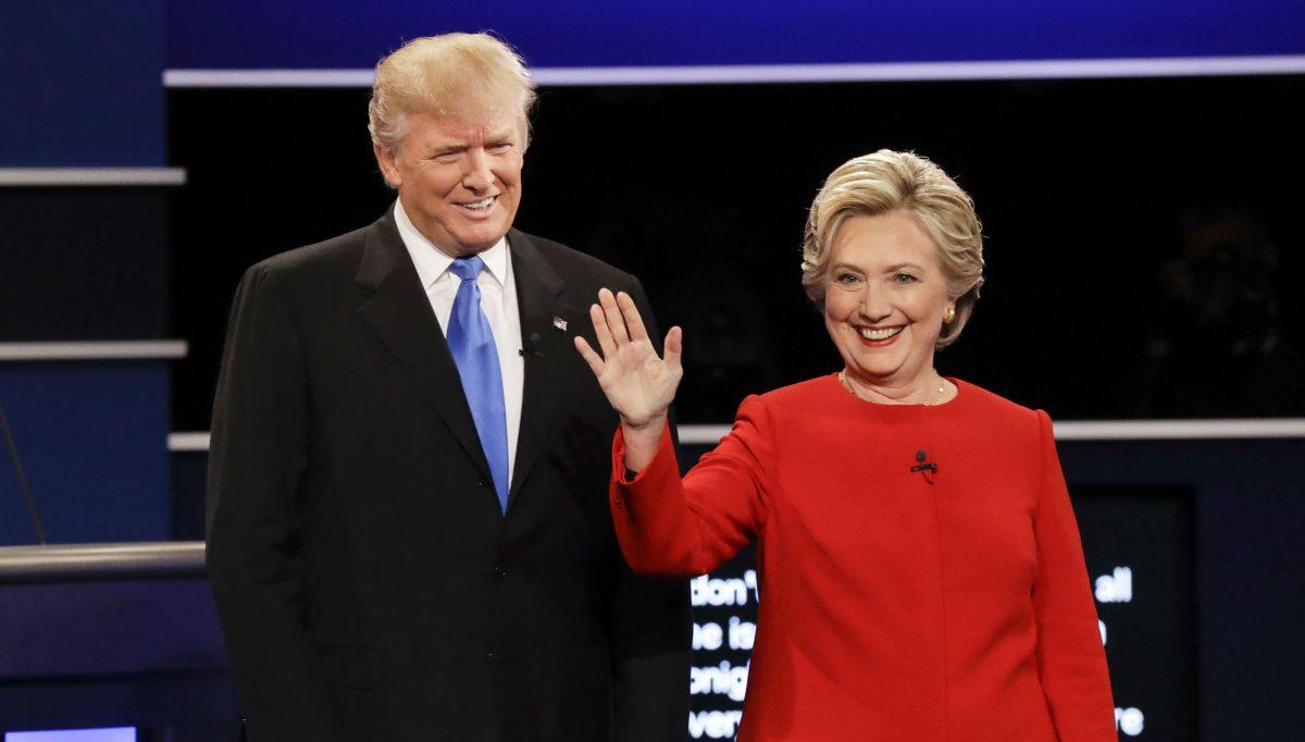 Republican presidential candidate Donald Trump and Democratic presidential nominee Hillary Clinton are introduced during the presidential debate at Hofstra University in Hempstead, N.Y., on Sept. 26, 2016. (David Goldman/AP Photo)