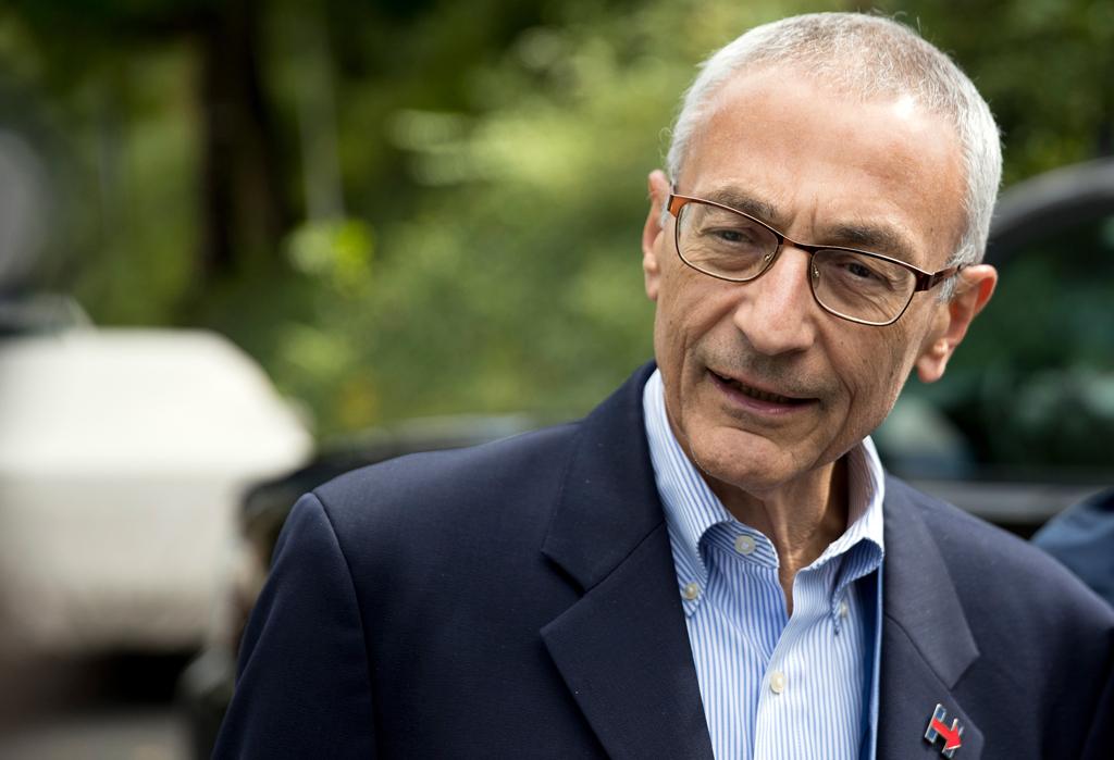 Hillary Clinton campaign chairman John Podesta speaks to reporters outside Clinton's home in Washington on Oct. 5, 2016. (Andrew Harnik/AP Photo)