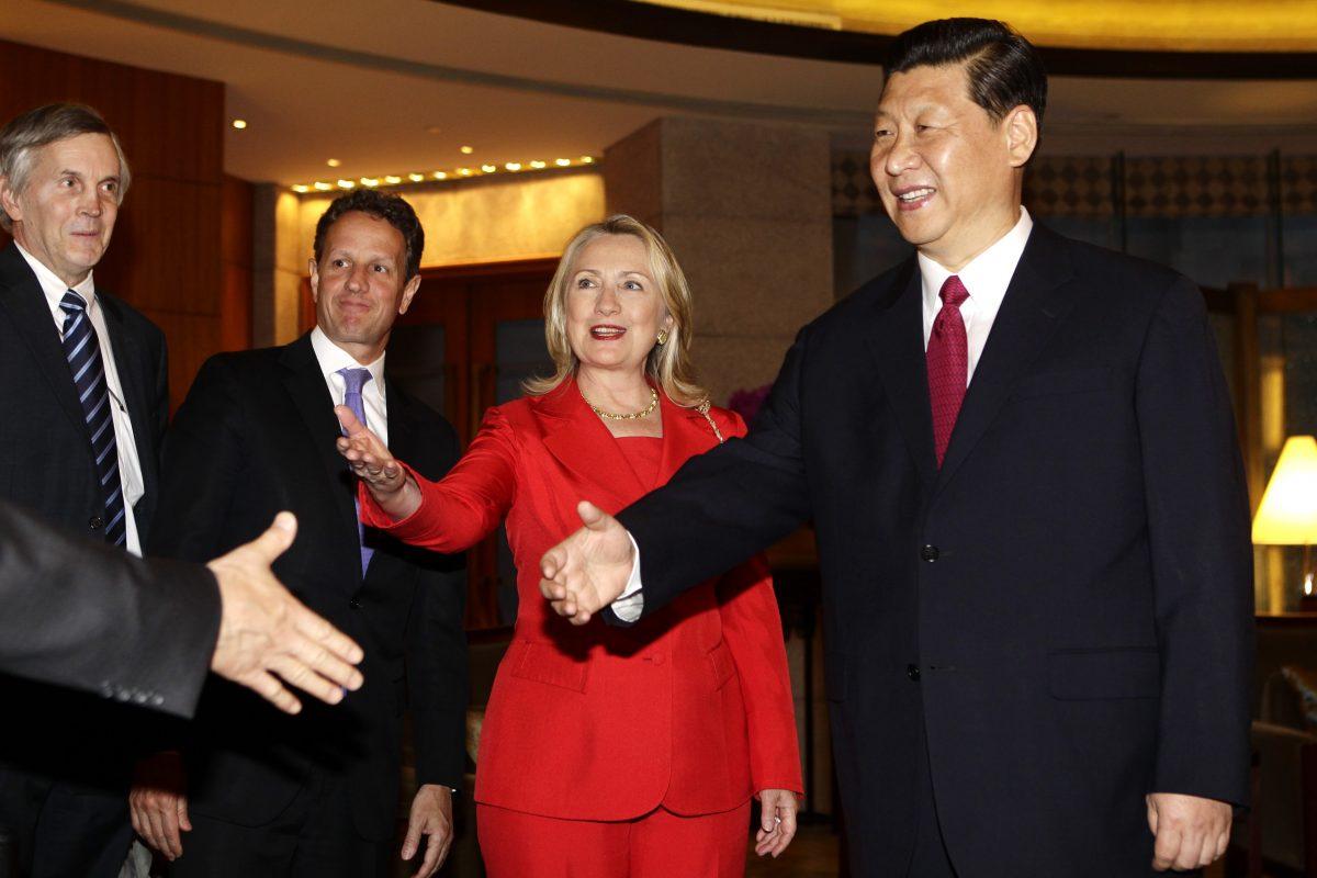 Chinese leader Xi Jinping meets U.S. Secretary of State Hillary Clinton, U.S. Treasury Secretary Timothy Geithner (2nd right), and other delegates during a meeting at Diaoyutai State Guesthouse in Beijing, on May 3, 2012. (Jason Lee/AFP/GettyImages)
