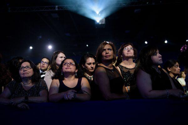 People listen as Democratic presidential nominee Hillary Clinton speaks during the Congressional Hispanic Caucus Gala on Sept. 15, 2016, in Washington.<br/>(Brendan Smialowski /AFP/Getty Images)