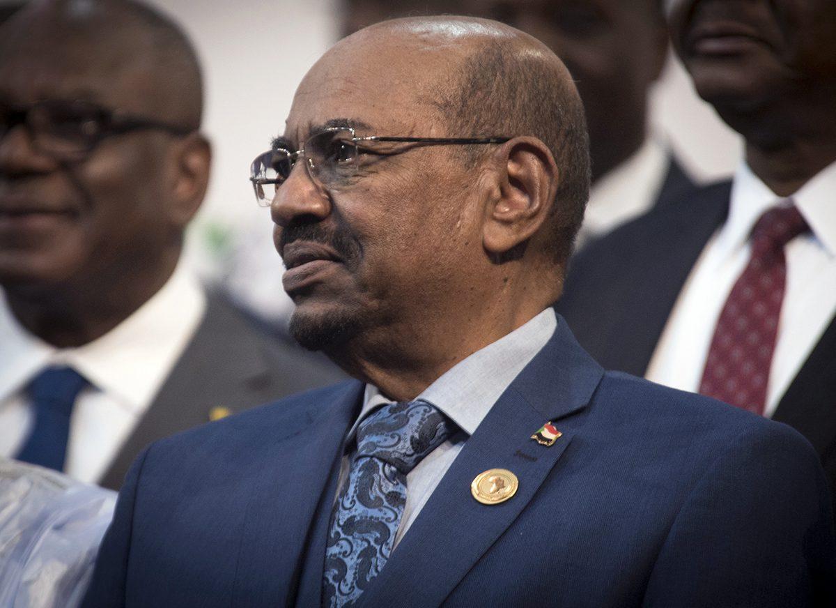 Former Sudanese President Omar al-Bashir attends a photo session at the African Union summit in Johannesburg, which has decided to withdraw from the International Criminal Court following a dispute over the visit by al-Bashir, who is wanted by the tribunal for alleged war crimes, crimes against humanity, and genocide. (Shiraaz Mohamed/AP Photo)