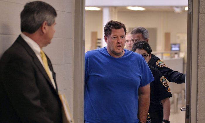 Man Who Chained Woman Like Dog Charged With 2003 Slayings
