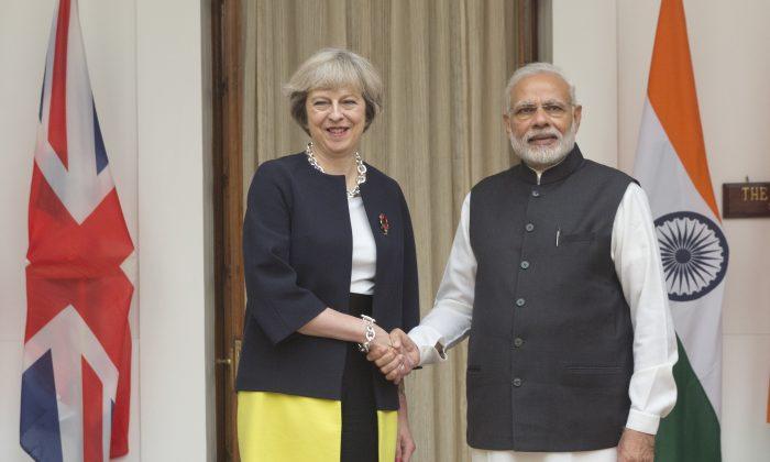 India, Britain Talk Trade and Investment During May’s Visit