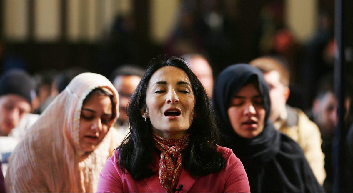 Muslim author Asra Nomani (C) prays with other women during a rare public mixed-gender, woman-led prayer service in New York City in this 2005 file photo.  (Chris Hondros/Getty Images)