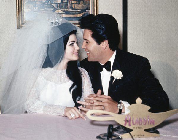 Singer Elvis Presley and his bride, the former Priscilla Beaulieu, appear at the Aladdin Hotel in Las Vegas, after their wedding on May 1, 1967. (AP Photo)