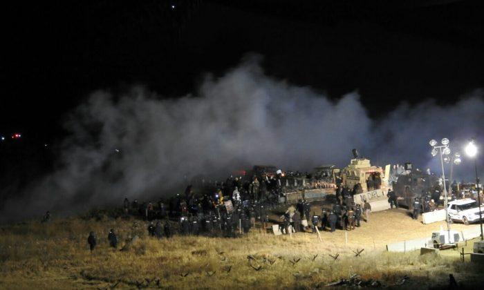 Officers Douse Pipeline Protesters in Subfreezing Weather