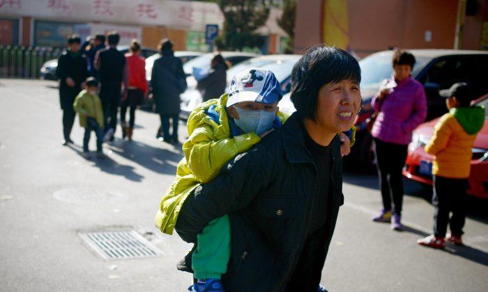 Women Continue to Face Coercion, Crippling Fines Under Two-Child Policy