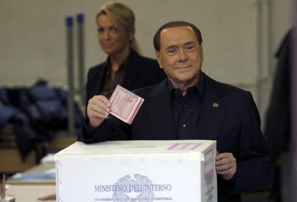 Former Italian Premier Silvio Berlusconi casts his ballot at a polling station in Rome on Dec. 4, 2016. (Gregorio Borgia/AP)