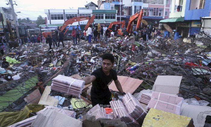 Aid Groups Descend on Indonesia Quake Zone; Deaths Reach 102