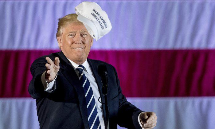 Trump Jovially Rejoins Campaign Trail, Tosses Hat to a Fan