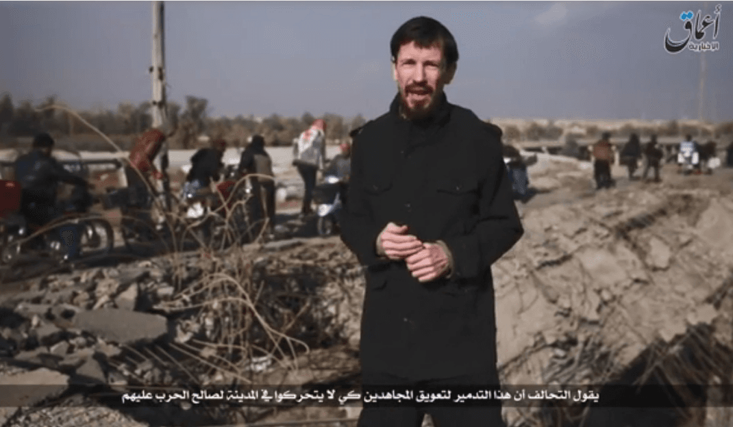 British war photographer and correspondent John Cantlie appears in an ISIS propaganda video on Dec. 7. He was captured by ISIS in Syria in Nov. 2012. (Screenshot/ISIS Propaganda)