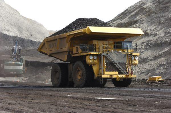 A mining dumper truck hauls coal at Cloud Peak Energy's Spring Creek strip mine near Decker, Mont., on April 4, 2013. (Matthew Brown/File Photo via AP)