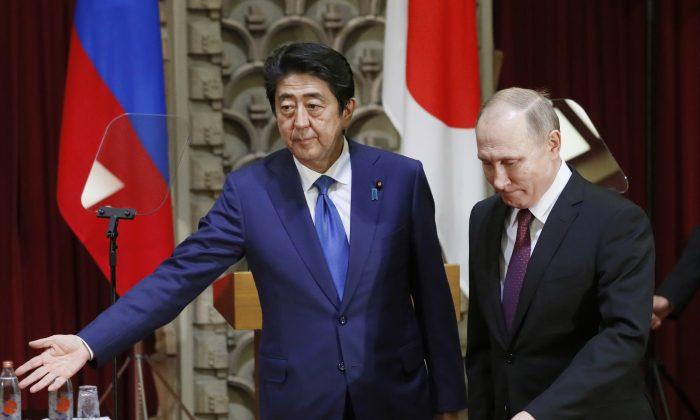 Putin Agreed to Strictly Enforce North Korea Sanctions, Says Abe