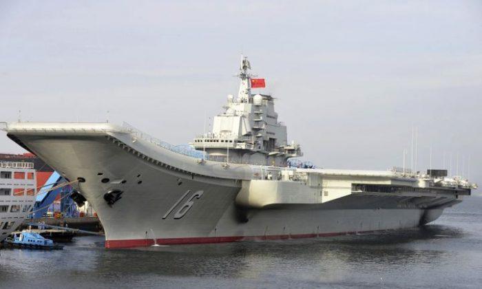 China’s First Aircraft Carrier Sails Into South China Sea