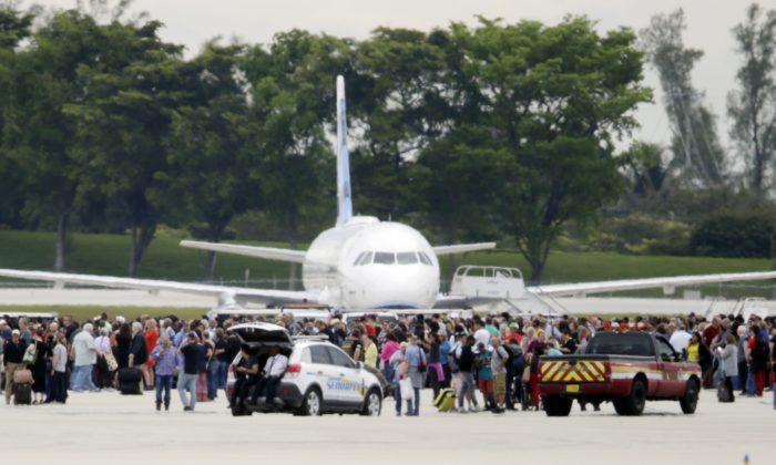 Gunman Picked Off Passengers, Sent Crowds Fleeing at Airport