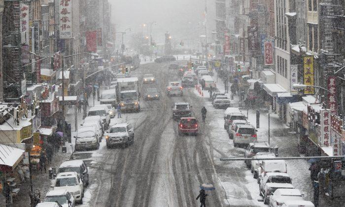 New Storm Hits West as South, New England Slow to Thaw
