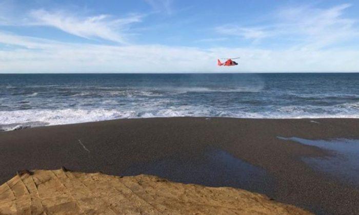 Search Resumes for Father, Toddler Swept Into Ocean by Wave