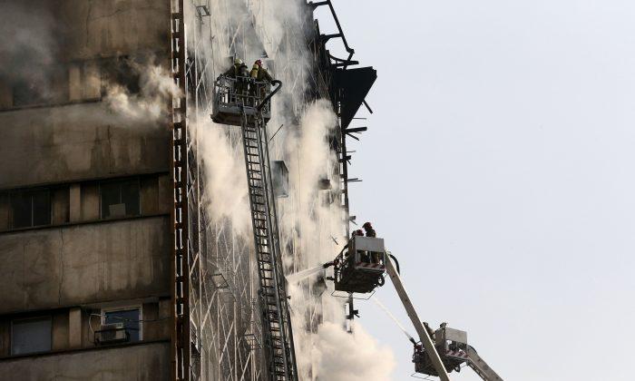 Collapse of Burning Tehran High-Rise Kills 30 Firefighters
