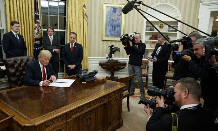 Trump Signs First Executive Order Telling Agencies to Ease Health Care Burden