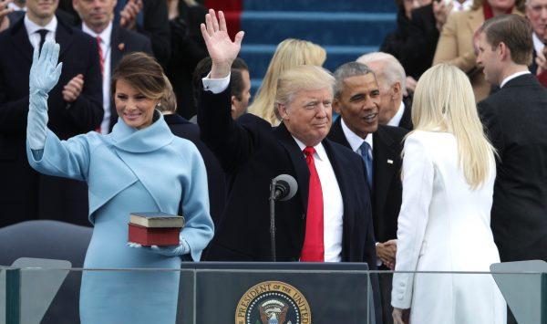 Then-President Donald Trump and then first-lady Melania Trump wave to the crowd as former president Barack Obama greets Tiffany Trump on the West Front of the U.S. Capitol in Washington, DC on Jan. 20, 2017. (Alex Wong/Getty Images)