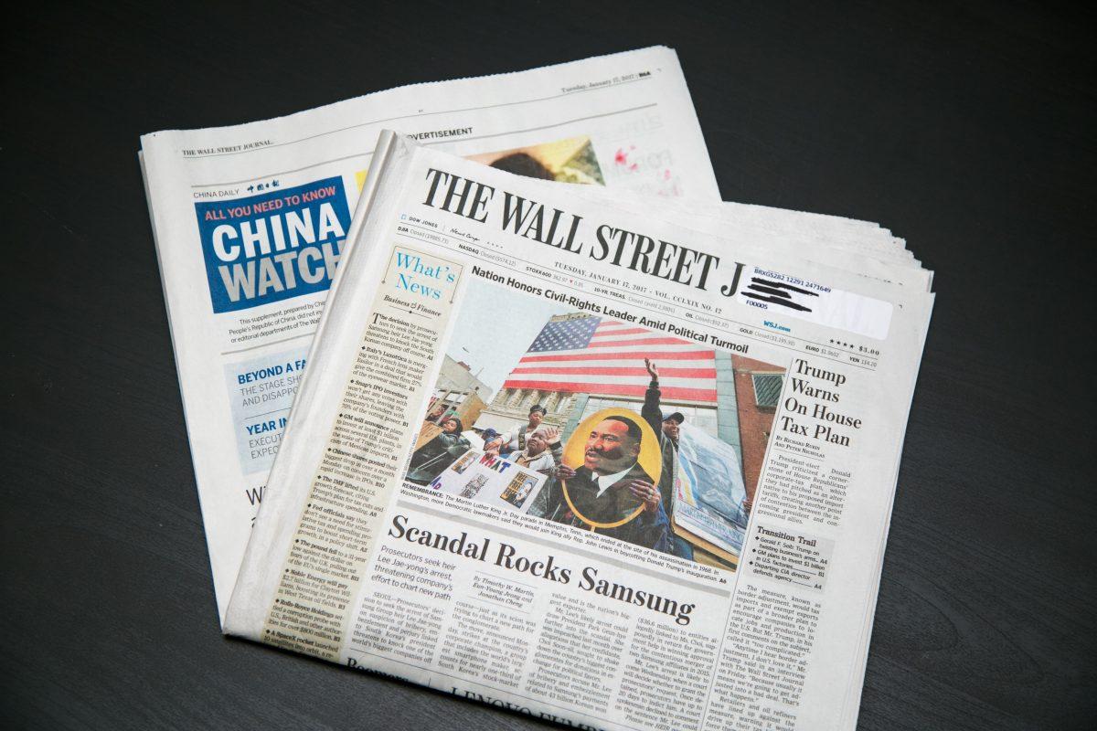 A paid insert of China Daily inside the Jan. 17, 2017, edition of The Wall Street Journal. (Benjamin Chasteen/Epoch Times)