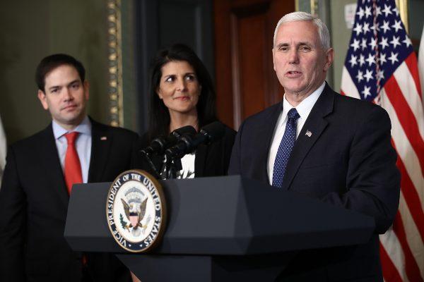 U.S. Vice President Mike Pence (R) delivers remarks during the swearing-in ceremony for Nikki Haley (C) as the U.S. Ambassador to the United Nations on Jan. 25, 2017 in Washington. Also pictured is Sen. Marco Rubio (R-Fla.) (L). (Win McNamee/Getty Images)
