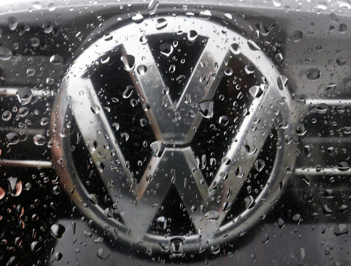 The Volkswagen logo is photographed through rain drops on a window in Frankfurt, Germany, on Nov. 18, 2016. (Michael Probst/AP Photo)
