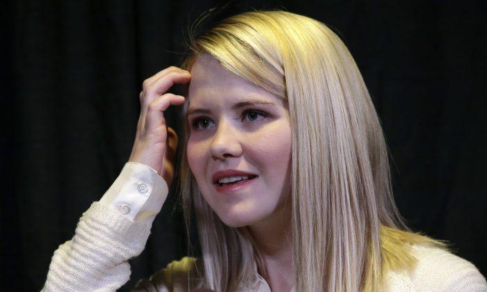 Man Accused of Punching Officer at Elizabeth Smart Event