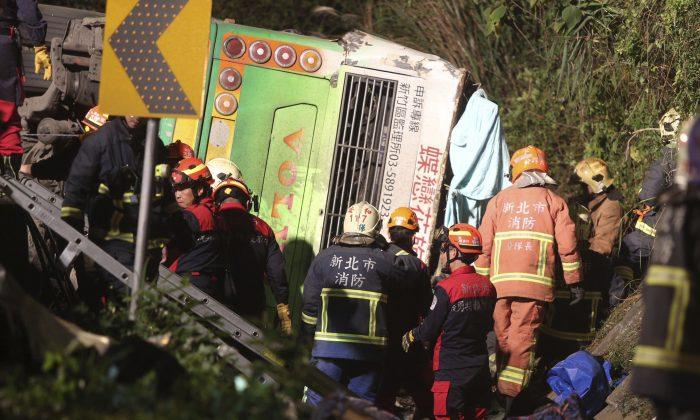 Tour Bus Flips Over on Taiwan Highway, Killing 32 People
