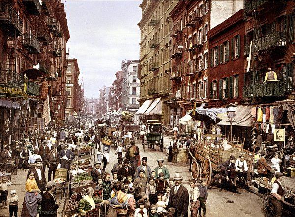 Mulberry Street market in New York City in the early 1900s. Manhattan's Little Italy is a classic example of how immigrants from the same nation settled in clusters in their new land. (Library of Congress)
