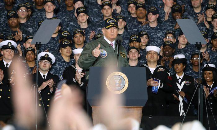 Trump, Aboard Navy Carrier, Vows to Boost Defense Spending