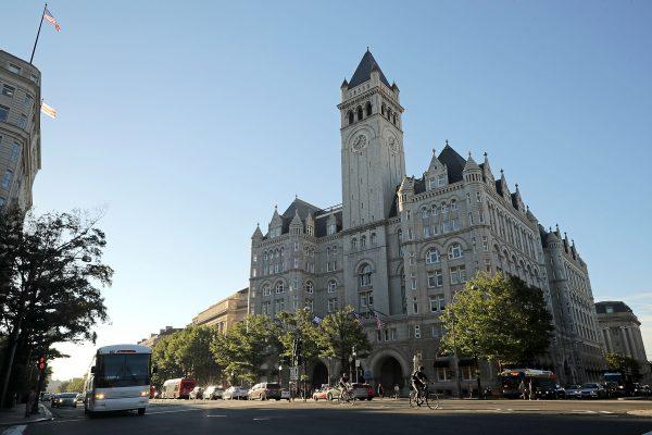 Morning traffic flows past the Trump International Hotel on its first day of business on Sept. 12, 2016 in Washington. The Trump Organization was granted a 60-year lease to the historic Old Post Office by the federal government before Trump announced his intent to run for president.  (Chip Somodevilla/Getty Images)