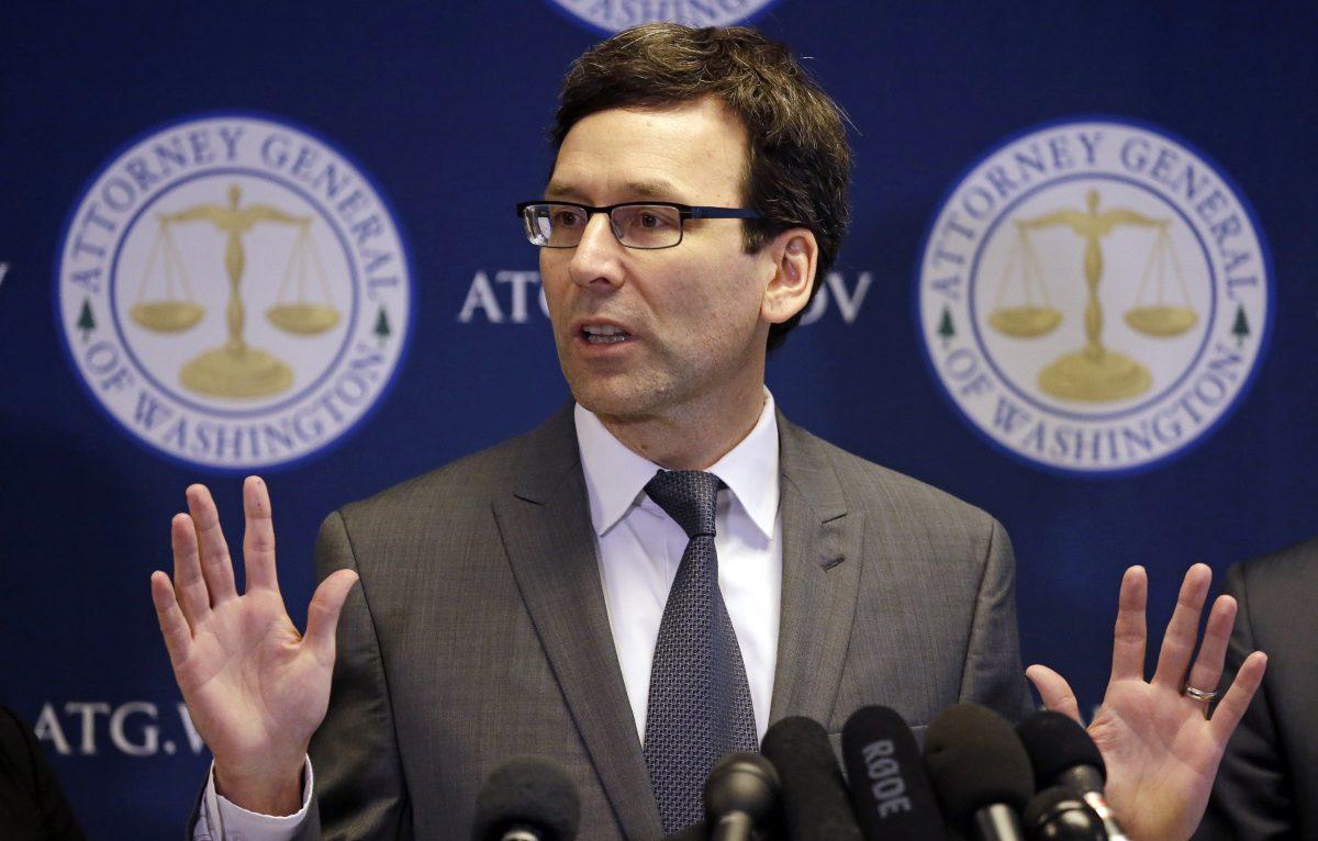 Washington Attorney General Bob Ferguson speaks at a news conference in Seattle about the state's response to President Donald Trump's revised travel ban on March 9, 2017. (Elaine Thompson/AP Photo)