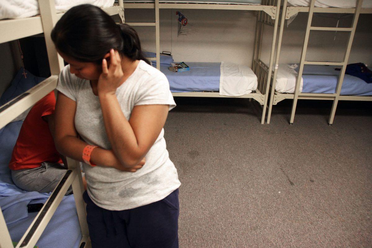 A Guatemalan woman in a federal detention facility for illegal immigrant mothers and children in Artesia, New Mexico, on Sept. 10, 2014. (AP Photo/Juan Carlos Llorca)