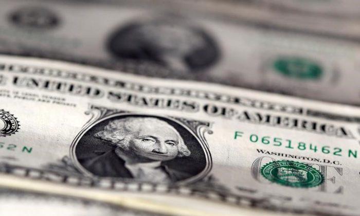Dollar Skids to Four-Month Low as Trump Trade Deflates