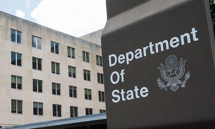 State Department Employee Charged in Making Contacts With Chinese Agents