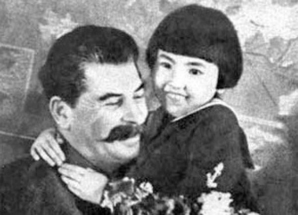 An iconic poster of Soviet dictator Joseph Stalin with a little girl named Gelya. The poster was used as propaganda to show the dictator as a father to his people. In fact, Stalin most likely had both of Gelya's parents killed. (Courtesy of William Vollinger)